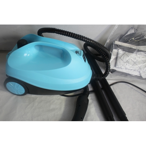 16 - RUSSELL HOBBS IRON AND STEAM CLEANER WITH ACCESSORIES