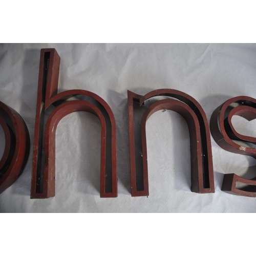 135 - METAL 'JOHNS' SIGN