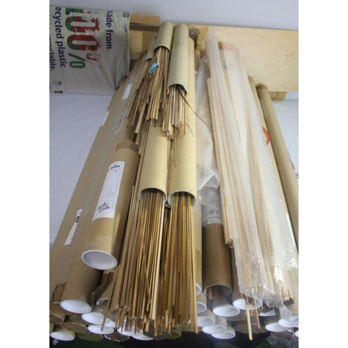 21 - QUANTITY OF TUBES CONTAINING VARIOUS MODEL BOAT BUILDING WOODEN STRIPS