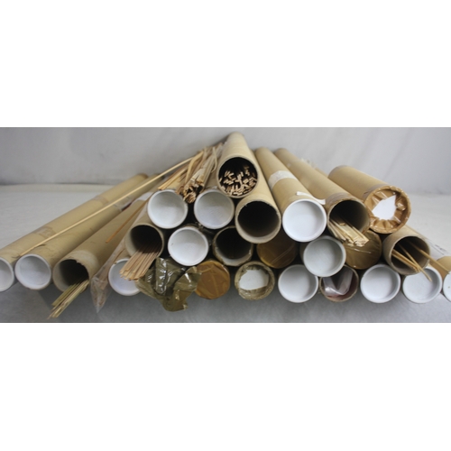 27 - QUANTITY OF TUBES CONTAINING VARIOUS MODEL BOAT BUILDING WOODEN STRIPS