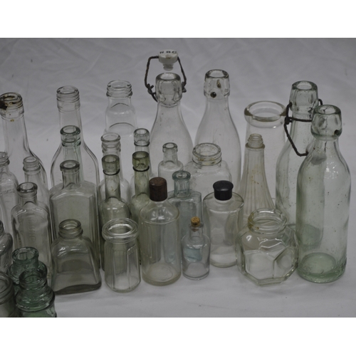 58 - VARIOUS GLASS BOTTLES