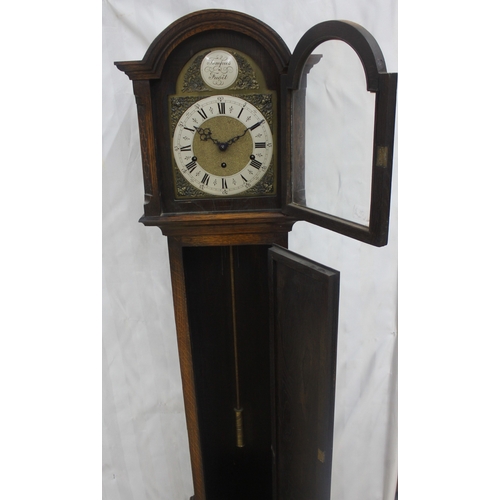 83 - TEMPUS FUGIT OAK CASED GRANDMOTHER CLOCK WITH KEY AND PENDULUM - WORM AFFECTED