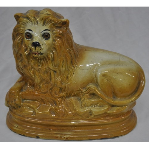 90 - PAIR OF STAFFORDSHIRE LIONS