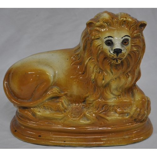 90 - PAIR OF STAFFORDSHIRE LIONS