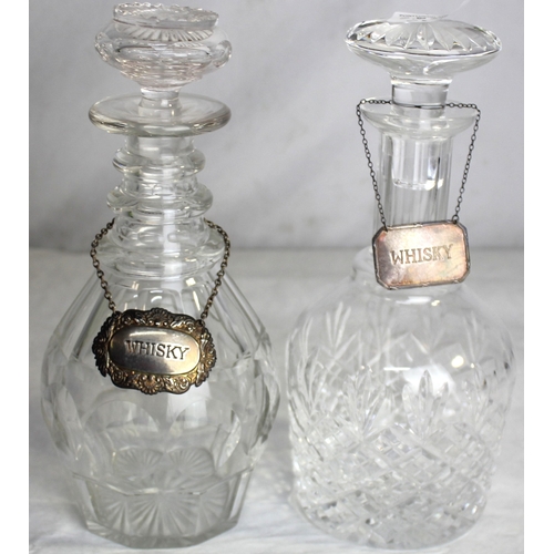 144 - 2 WHISKY DECANTERS - ONE WITH SILVER LABEL