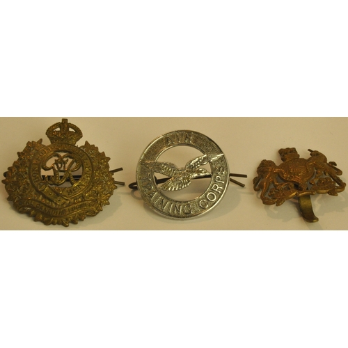 142 - 7 CAP BADGES