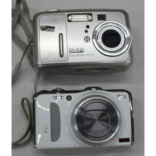 64 - 4 DIGITAL CAMERAS