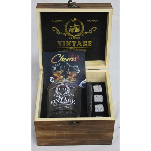 114 - 8 SETS OF WHISKY GLASS, COASTER AND 4 WHISKY STONES IN WOODEN BOX - (6 x 1984, 2 x 2003)