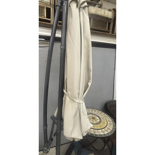 32 - FIREPIT GARDEN TABLE, 2 METAL FRAME WOVEN CHAIRS, LARGE PARASOL & BASE PLUS A SET OF 4 PARASOL B... 