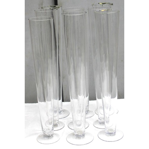 21 - VARIOUS LARGE GLASS VASES INCLUDING A SET OF 9 TALL STEM GLASSES CONICAL VASES