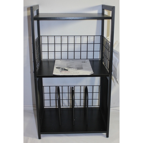 83 - NEW RECORD STAND