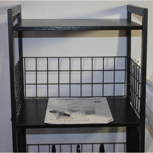 83 - NEW RECORD STAND