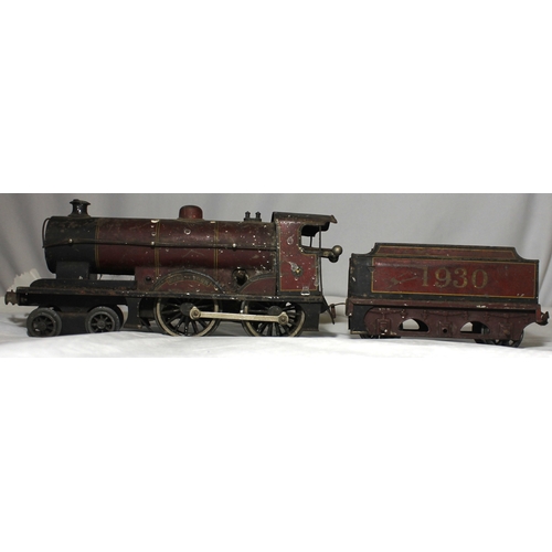 97 - 0 GAUGE CLOCKWORK LOCOMOTIVE AND TENDER