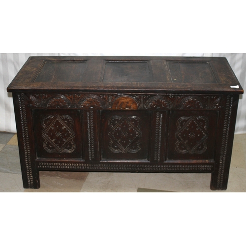 189 - OAK THREE PANEL COFFER WITH CARVED FRONT