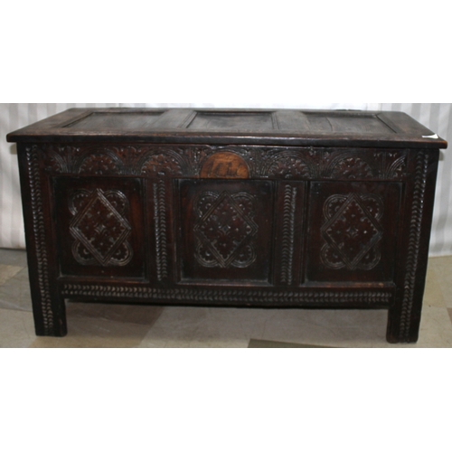 189 - OAK THREE PANEL COFFER WITH CARVED FRONT