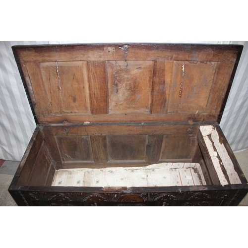 189 - OAK THREE PANEL COFFER WITH CARVED FRONT