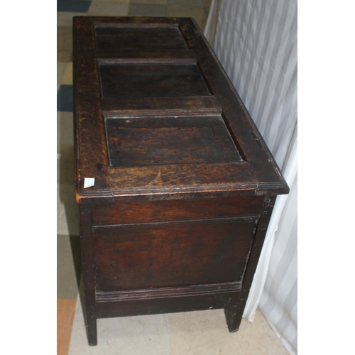 189 - OAK THREE PANEL COFFER WITH CARVED FRONT
