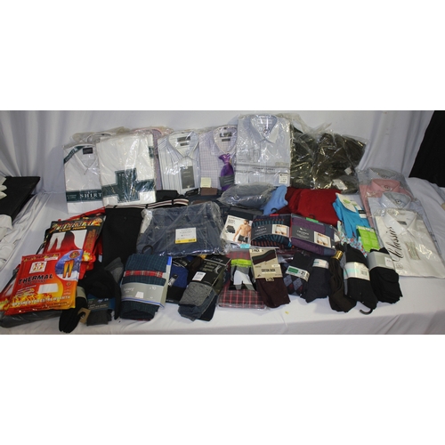 232 - BOX OF NEW CLOTHES INCLUDING SHIRTS, TROUSERS AND SOCKS