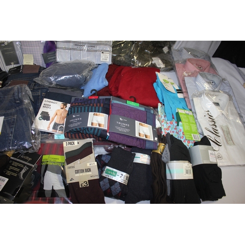 232 - BOX OF NEW CLOTHES INCLUDING SHIRTS, TROUSERS AND SOCKS