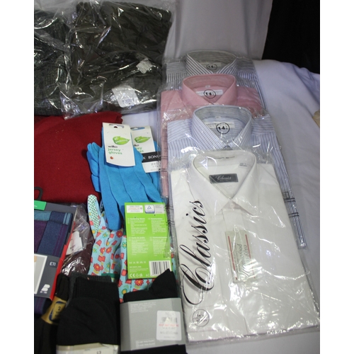 232 - BOX OF NEW CLOTHES INCLUDING SHIRTS, TROUSERS AND SOCKS