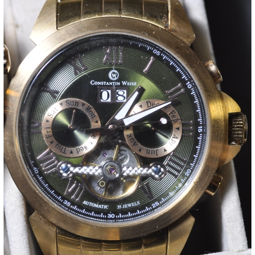 274 - 3 WATCHES IN DISPLAY CASE