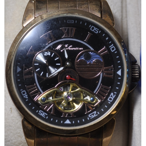 298 - 4 WATCHES IN DISPLAY CASE