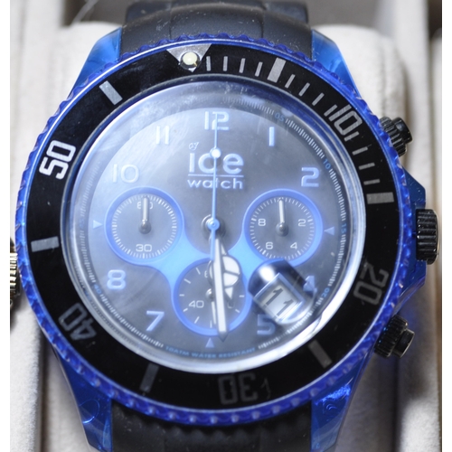298 - 4 WATCHES IN DISPLAY CASE