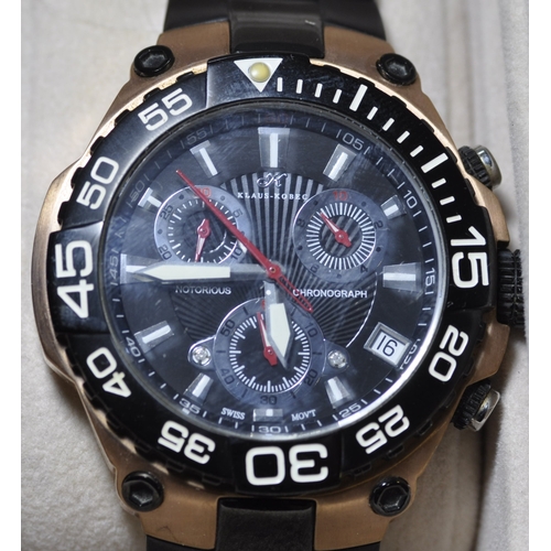 298 - 4 WATCHES IN DISPLAY CASE