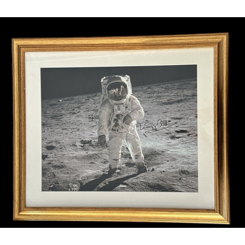 112 - Buzz Aldrin astronaut signed colour photo of Buzz on the Moon. Mounted and framed, measures 24x26 in... 