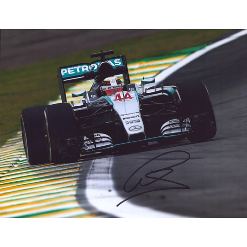 132 - Lewis Hamilton signed 10x8 inch colour photo driving a Mercedes AMG Petronas Formula one car.