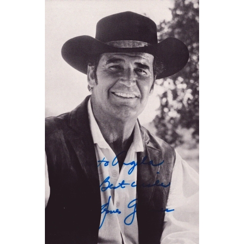 69 - James Garner signed 6x4 approx black and white postcard, dedicated.