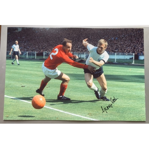 46 - George Cohen 1966 World Cup football hero signed 12 x 8 inch colour action photo. Single Vendor auto... 