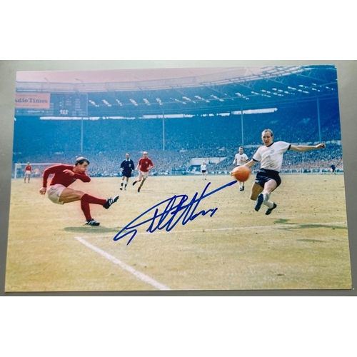 48 - Geoff Hurst 1966 World Cup football signed 12 x 8 inch colour England photo. Sir Geoffrey Charles Hu... 