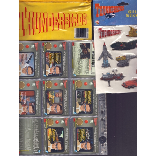 4 - Thunderbirds trading cards collection with Thunderbirds pencil case and stickers. Over 40 in collect... 