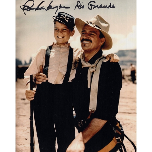 587 - John Wayne movie Rio Grande colour 8x10 photo signed by his son and co-star Patrick Wayne