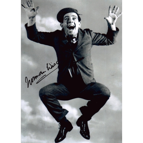 85 - Norman Wisdom signed 8x6inch black and white photo.