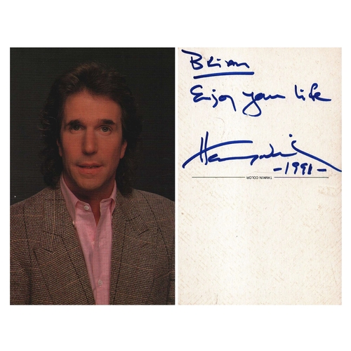 122 - Henry Winkler signed on reverse 6x4 inch colour photo postcard. Dedicated.