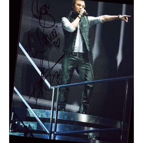 130 - Lloyd Daniels signed 12x8inch colour photo.