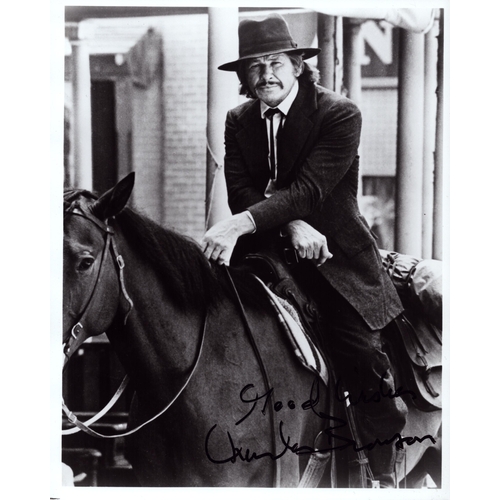 65 - Charles Bronson signed 10x8inch black and white photo.