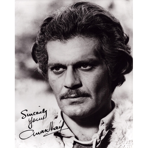 73 - Omar Sharif signed 10x8inch black and white photo.