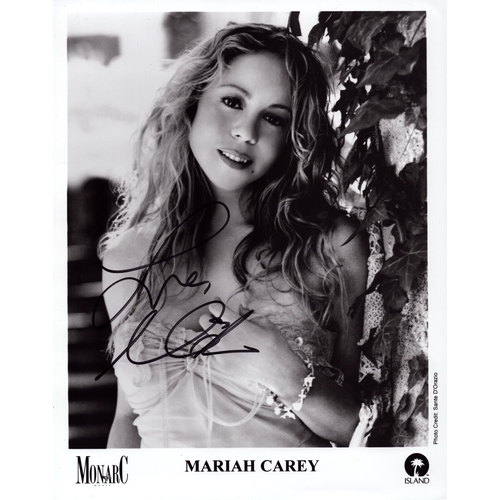 82 - Mariah Carey signed 10x8inch black and white promo photo.