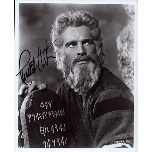 85 - Charlton Heston signed 10x8inch black and white photo.