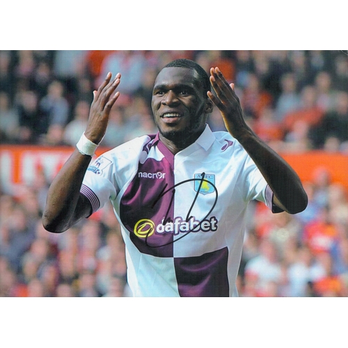 107 - Christian Benteke signed 12x8 inch colour photo pictured during his time with Aston Villa. Good cond... 