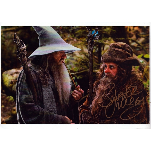 86 - Sylvester McCoy signed 11.5x8.5inch colour photo.