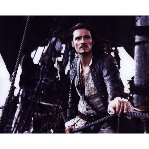 138 - Orlando Bloom signed 10x8inch Pirates of the Caribbean colour photo.