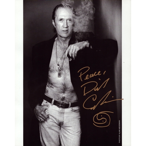 144 - David Carradine signed 10x8inch black and white photo.