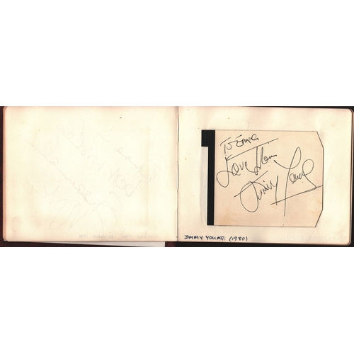 33 - Autograph book.  Amongst signatures are Ken Dodd, Jimmy Young, Eric Morecambe, Alvin Stardust, Donal... 