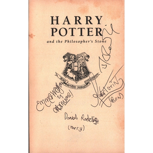 1 - Harry Potter and the Philosophers Stone first edition paperback book.  Signed by  J K Rowling, Danie... 