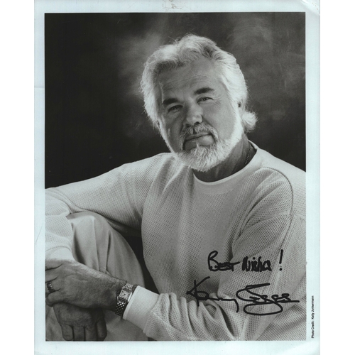 12 - Kenny Rogers signed 10x8inch black and white photo.
