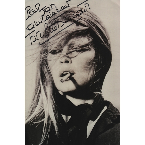 35 - Brigitte Bardot signed 12x8inch black and white photo.